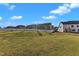 Large grassy area with white vinyl fence at 616 Silver Comet Dr, Knightdale, NC 27545