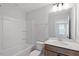 Bathroom featuring a tub with shower, toilet, and sink with a vanity at 707 Georgias Landing Pkwy # 105, Raleigh, NC 27603