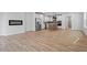 Open-concept kitchen with stainless steel appliances and a large island at 707 Georgias Landing Pkwy # 105, Raleigh, NC 27603