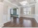 Spacious dining room with hardwood floors and coffered ceiling at 102 Dungannon Loop, Clayton, NC 27520