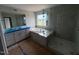 A luxurious bathroom boasting a shower, tub, and double vanity at 111 Demascus Way # 021, Four Oaks, NC 27524
