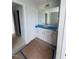A bathroom vanity and doorway to the tub and shower area at 111 Demascus Way # 021, Four Oaks, NC 27524