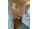 Bathroom featuring a shower-tub combination, white toilet, and vanity with storage at 111 Demascus Way # 021, Four Oaks, NC 27524