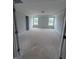 A large, well-lit bedroom with tray ceilings and bright windows at 111 Demascus Way # 021, Four Oaks, NC 27524