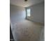 Bedroom with neutral walls, base trim, and a single window at 111 Demascus Way # 021, Four Oaks, NC 27524