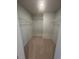 Walk-in closet with carpet flooring and wire shelving providing ample storage space at 111 Demascus Way # 021, Four Oaks, NC 27524