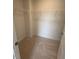 Walk-in closet with carpet flooring and wire shelving providing ample storage space at 111 Demascus Way # 021, Four Oaks, NC 27524
