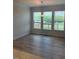 Dining area filled with natural light, with large windows overlooking the backyard at 111 Demascus Way # 021, Four Oaks, NC 27524