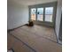 Bright dining room has three large windows providing natural light and views of the surrounding landscape at 111 Demascus Way # 021, Four Oaks, NC 27524