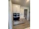 Well-designed kitchen area with built-in oven and ample cabinet space at 111 Demascus Way # 021, Four Oaks, NC 27524