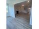 Spacious living room with adjacent dining and entrance at 111 Demascus Way # 021, Four Oaks, NC 27524