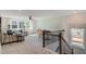 Cozy bonus room with comfortable seating, ample natural light, and stylish decorative details at 111 Demascus Way # 021, Four Oaks, NC 27524
