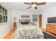 Comfortable bedroom with hardwood floors and ample natural light at 1148 Sturdivant Dr, Cary, NC 27511