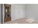 Bright bedroom with carpet, neutral walls, and a large closet for all your storage needs at 9216 Leaning Post Rd # 447, Wake Forest, NC 27587