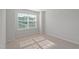 Bedroom with neutral carpet and a window providing great natural light at 9216 Leaning Post Rd # 447, Wake Forest, NC 27587