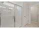 Shower room features a sleek glass door, subway tile, and recessed lighting at 9216 Leaning Post Rd # 447, Wake Forest, NC 27587