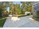 Spacious backyard with a large concrete patio and storage shed at 1604 Burnt Mill Rd, Rocky Mount, NC 27804