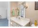 Simple bathroom with vanity, mirror, and light green accents at 1604 Burnt Mill Rd, Rocky Mount, NC 27804