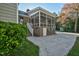 Screened porch with brick steps and access to backyard at 1604 Burnt Mill Rd, Rocky Mount, NC 27804
