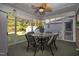 Screened sunroom with ceiling fan and outdoor views at 1604 Burnt Mill Rd, Rocky Mount, NC 27804
