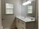 Well-lit bathroom with vanity and updated fixtures at 3016 Old Craig Trail, Mebane, NC 27302