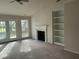 Spacious living room with fireplace and built-in shelving at 3016 Old Craig Trail, Mebane, NC 27302