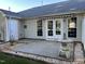 Back patio with double doors and lantern at 3016 Old Craig Trail, Mebane, NC 27302