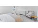 Comfortable bedroom with plush carpet, a soft armchair, and lots of natural light at 114 Hickory Grove Dr, Sanford, NC 27330
