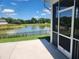This outdoor space has a view of a backyard pond with a black fence for safety and clear property boundary at 1230 Linkwood, Homesite 44, Fuquay Varina, NC 27526