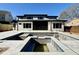 Newly constructed in-ground pool with plenty of space and screen porch on modern home's back at 662 Manchester Dr, Raleigh, NC 27609