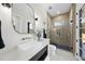 Modern bathroom featuring a glass-enclosed shower, floating sink and modern finishes at 662 Manchester Dr, Raleigh, NC 27609