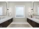 Bright bathroom featuring dual vanities, and modern fixtures, designed for comfort and elegance at 662 Manchester Dr, Raleigh, NC 27609