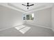 A bright, spacious bedroom featuring a corner window offering natural light and outdoor views at 662 Manchester Dr, Raleigh, NC 27609