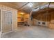 Unfinished basement with concrete floors and exposed ductwork provides ample space for storage or customization at 3105 Cone Manor Ln, Raleigh, NC 27613