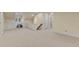 Expansive basement with neutral carpet, stairs, storage, and multiple entry points at 3105 Cone Manor Ln, Raleigh, NC 27613
