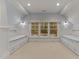 Serene bedroom featuring twin built-in beds and large window with a pleasant view at 3105 Cone Manor Ln, Raleigh, NC 27613