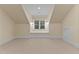 Cozy bedroom with window seat offering natural light and neutral tones at 3105 Cone Manor Ln, Raleigh, NC 27613