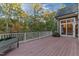 Spacious wood deck overlooking a lush treeline at 3105 Cone Manor Ln, Raleigh, NC 27613