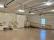 Well-lit garage with cabinetry and ramp at 3105 Cone Manor Ln, Raleigh, NC 27613