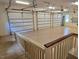 Large garage with three white garage doors provides secure parking and storage space at 3105 Cone Manor Ln, Raleigh, NC 27613