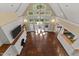 Bright and airy living room with soaring ceilings, fireplace, and floor-to-ceiling windows at 3105 Cone Manor Ln, Raleigh, NC 27613