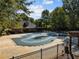 Exterior view of the in-ground community pool, covered with a tarp for the off season at 3105 Cone Manor Ln, Raleigh, NC 27613