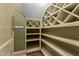 Custom storage and wine rack in this well-organized, finished storage room at 3105 Cone Manor Ln, Raleigh, NC 27613