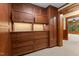 This wardrobe has drawers and lighting and complements the trim around the door at 3105 Cone Manor Ln, Raleigh, NC 27613