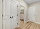 Hallway with closet and laundry nook at 9314 Turkey Way, Middlesex, NC 27557