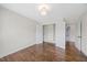 Bedroom showcases hardwood flooring, a closet and an overhead light at 2024 Stanchion St, Haw River, NC 27258