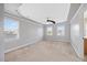 Bright bedroom features carpet, a trey ceiling, an overhead fan and a window at 2024 Stanchion St, Haw River, NC 27258