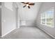 Upstairs bonus room with carpet, dormer windows, and ceiling fan at 2024 Stanchion St, Haw River, NC 27258