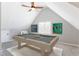 Upstairs game room with carpet, ceiling fan and pool table at 2024 Stanchion St, Haw River, NC 27258