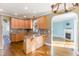Open kitchen with granite countertops, wood cabinetry and stainless appliances at 2024 Stanchion St, Haw River, NC 27258